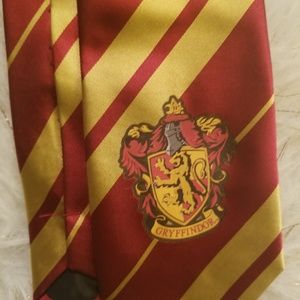 Gryffindor tie and wand